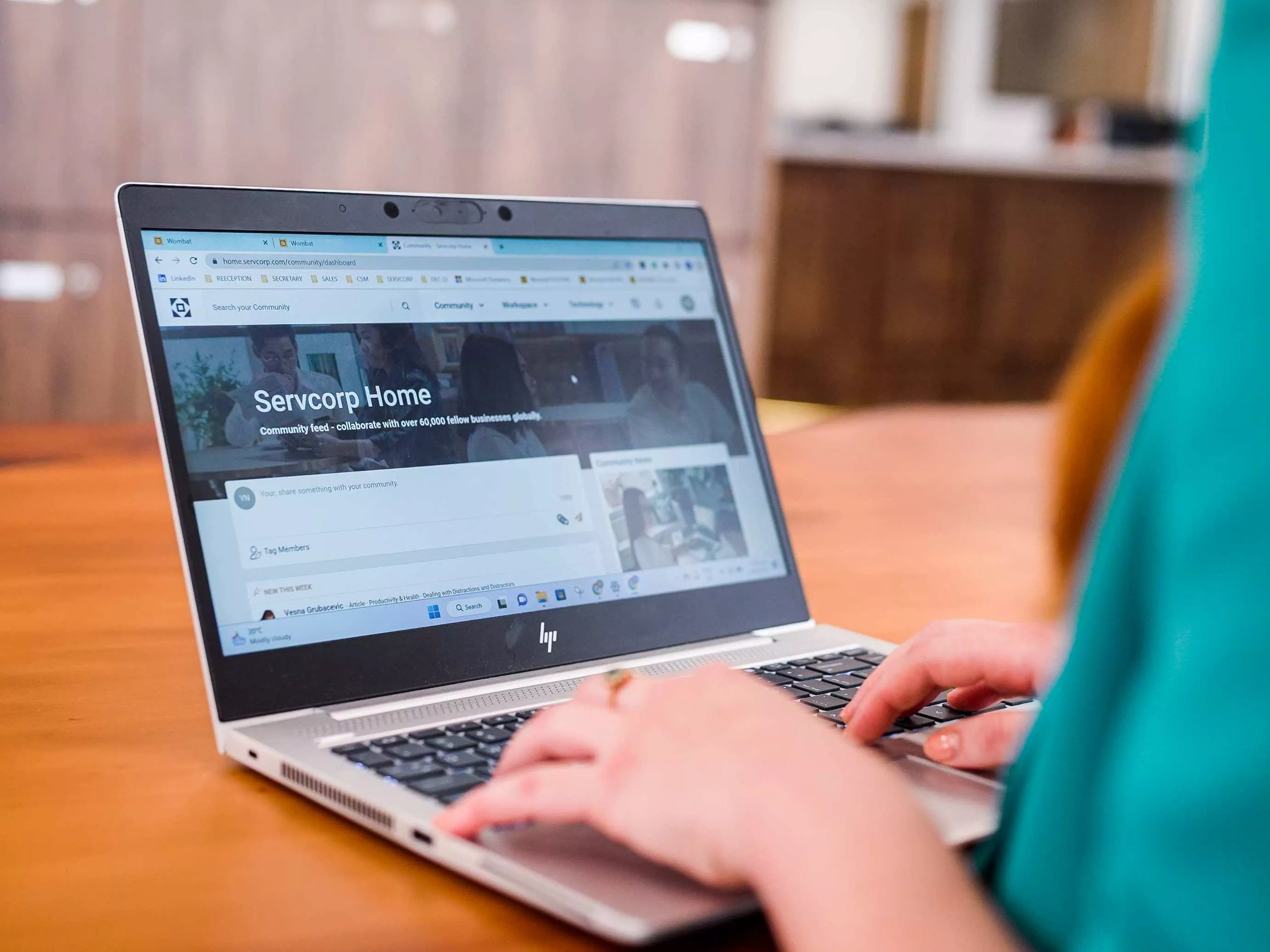 Extreme close up on a client receiving help online with IT specialists in Servcorp Bell Gully Building, Wellington